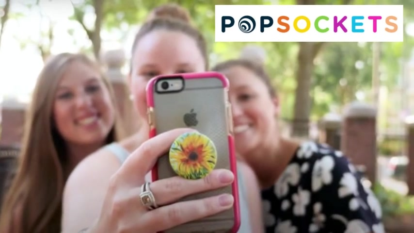 PopSockets lifestyle image showing a PopSocket in use on a phone